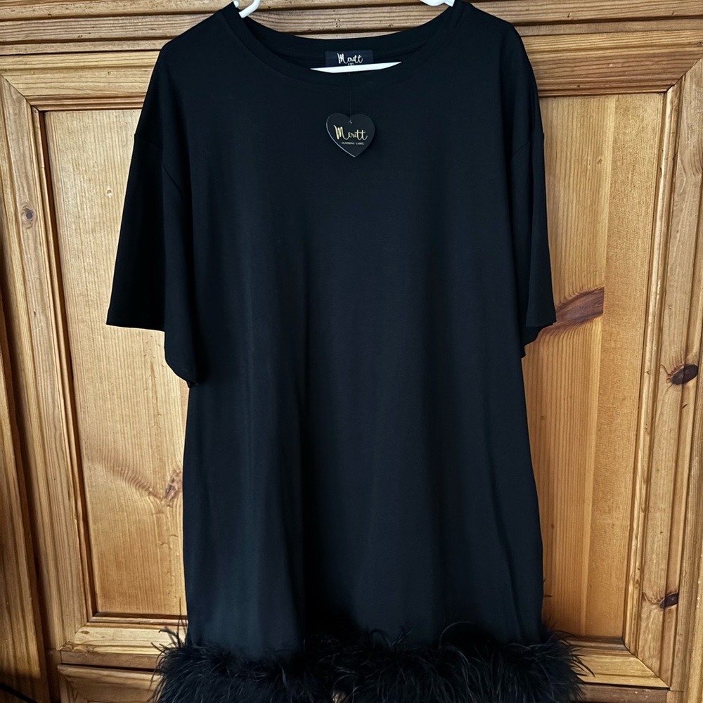 Black Tee Shirt Dress with feathers from Impressions.  New with tags.